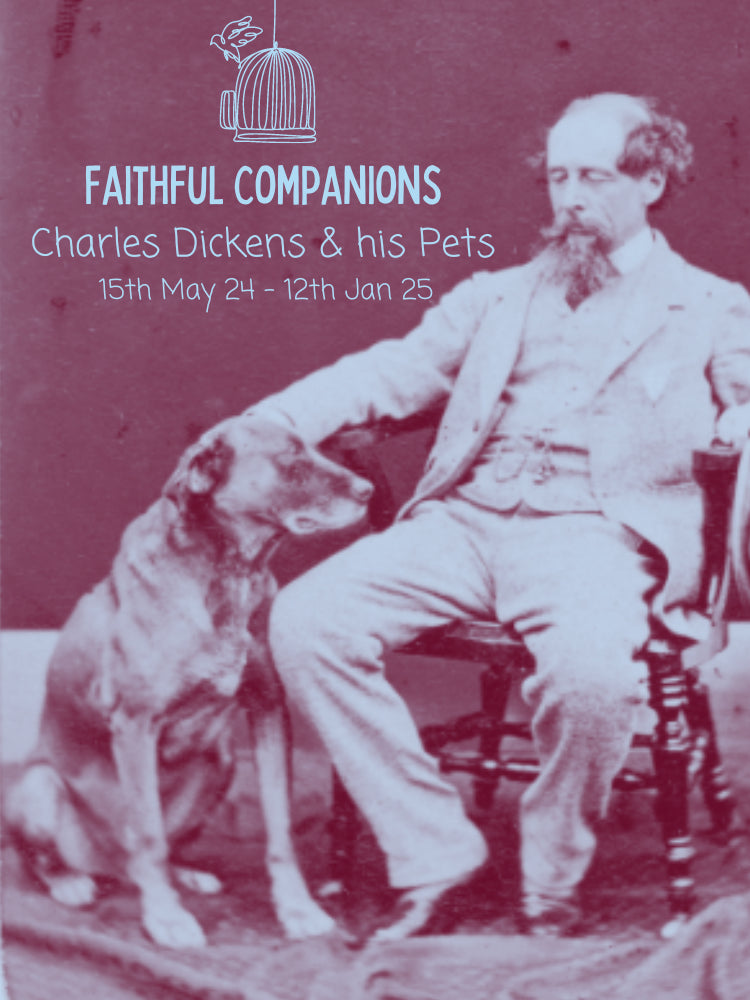 Charles Dickens in a sepia photograph, seated and stroking his dog.
